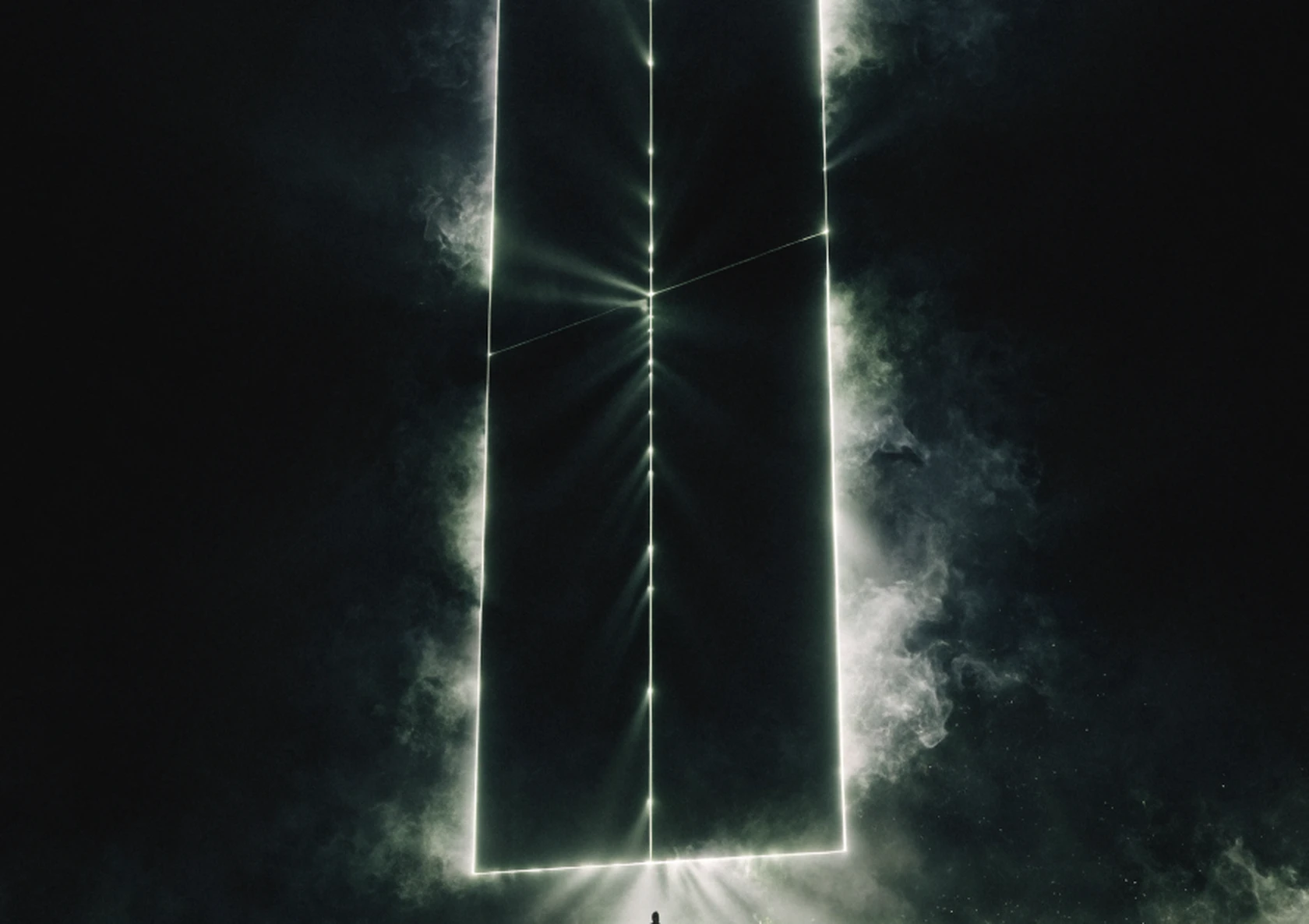 An immense shut gate of light with a single small figure standing before it.